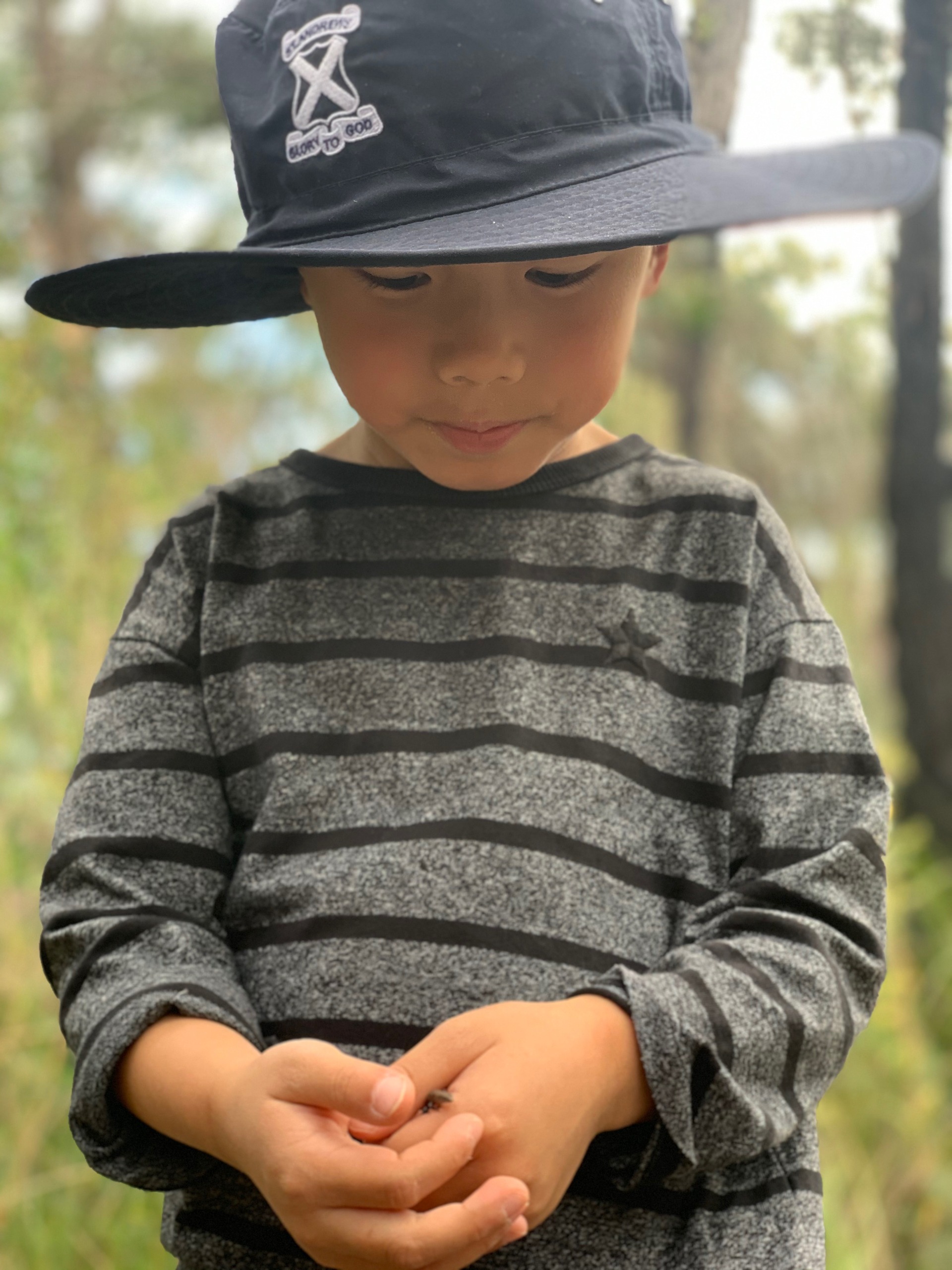 Boy with lizard